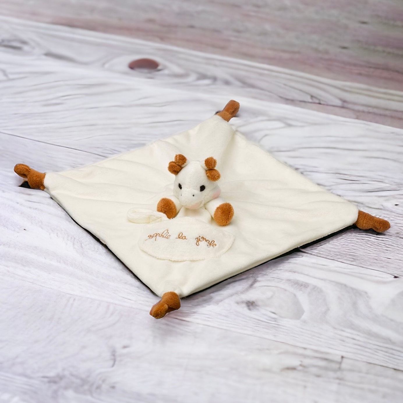 Sophie the Giraffe comforter with soother holder
