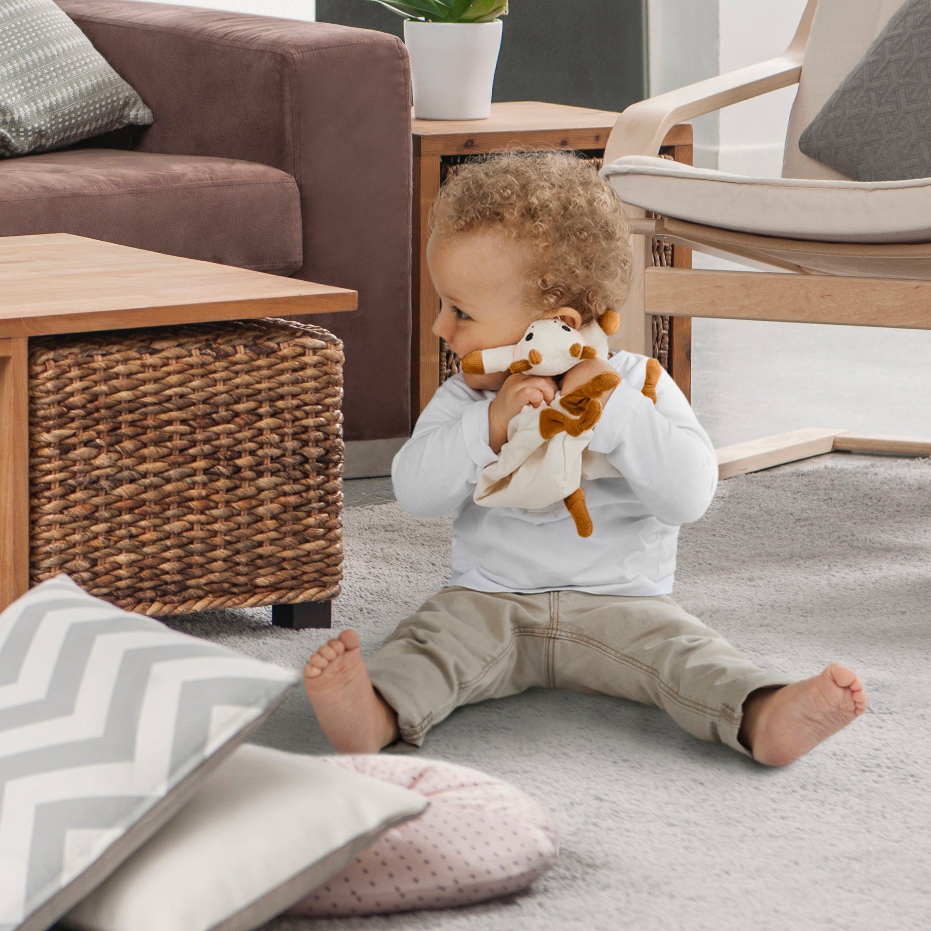 Sophie the Giraffe comforter with soother holder